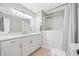 Clean bathroom featuring a white vanity, walk in shower, and modern lighting fixtures at 3119 Medley Rdg, Decatur, GA 30033