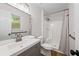 Bathroom featuring modern fixtures, tile flooring, and a white vanity at 3119 Medley Rdg, Decatur, GA 30033