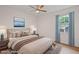 Comfortable bedroom with a ceiling fan, hardwood floors, and curtains for natural light reduction at 3119 Medley Rdg, Decatur, GA 30033