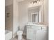 Bathroom with a white vanity, large mirror, and shower-tub combination at 4525 Aiden Way, Cumming, GA 30041