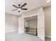 Bedroom with neutral colors, carpet flooring, and an open doorway to the landing and stairs at 4525 Aiden Way, Cumming, GA 30041