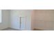 Bedroom with closet and wire shelving and window to outside at 4525 Aiden Way, Cumming, GA 30041