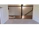 Upstairs hallway landing with wood floors and a modern railing at 4525 Aiden Way, Cumming, GA 30041