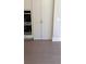 Spacious pantry with shelving located next to stainless steel ovens and hardwood floors at 4525 Aiden Way, Cumming, GA 30041