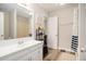 A well-appointed bathroom featuring a shower/tub combo and modern fixtures at 573 Hastings Way, Jonesboro, GA 30238