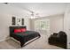 A well-lit bedroom features a large bay window and black-out curtains at 573 Hastings Way, Jonesboro, GA 30238