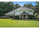 Charming two-story home with lush front lawn and inviting covered entrance at 573 Hastings Way, Jonesboro, GA 30238