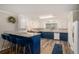 Stylish kitchen with granite countertops, updated appliances, and a breakfast bar at 573 Hastings Way, Jonesboro, GA 30238