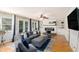 Comfortable living room with a fireplace, built-in shelves, and hardwood floors at 573 Hastings Way, Jonesboro, GA 30238