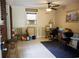 Versatile room with tile flooring, neutral walls, and a ceiling fan at 127 Perry St, Loganville, GA 30052