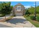 Charming brick townhome with two-car garage and manicured landscaping at 1858 Glenview Park Cir, Duluth, GA 30097