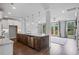 Open concept kitchen with granite counters, stainless steel appliances and large island at 1858 Glenview Park Cir, Duluth, GA 30097