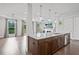 Gourmet kitchen featuring a granite island and hardwood floors at 1858 Glenview Park Cir, Duluth, GA 30097