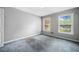 Bedroom with carpeted floor and natural light at 2930 Heather Stone Way, Lawrenceville, GA 30043