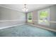 Sunlit bedroom featuring a classic chandelier and neutral paint at 2930 Heather Stone Way, Lawrenceville, GA 30043