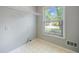 Laundry room featuring a window, shelving, and washer/dryer hookups at 2930 Heather Stone Way, Lawrenceville, GA 30043