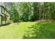 Large backyard with patio and room for outdoor entertaining at 3139 Fairview Dr, Snellville, GA 30078