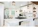 Bright kitchen with marble countertops, stainless steel appliances, white cabinetry, and a breakfast nook at 3139 Fairview Dr, Snellville, GA 30078