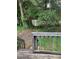 Backyard view from upper deck featuring a wooden shed and tiered levels at 4059 Heritage Valley Ct, Norcross, GA 30093