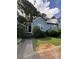 Charming single-Gathering home features a covered porch, lush landscaping, and a well-maintained lawn at 4059 Heritage Valley Ct, Norcross, GA 30093