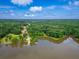 Beautiful aerial view of a wooded homesite at 410 Iroquois Court with lake access and a private dock at 410 Iroquois Ct, Covington, GA 30014