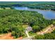 Aerial view of the home site showing the house and beautiful surroundings at 410 Iroquois Ct, Covington, GA 30014