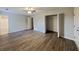 Spacious main bedroom featuring wood floors, ceiling fan, and a walk-in closet at 155 Fairclift Dr, Covington, GA 30016
