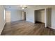 Spacious main bedroom with hardwood floors, ceiling fan and a walk-in closet at 155 Fairclift Dr, Covington, GA 30016