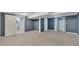 Spacious basement with carpet floors offers easy access to a bathroom and a closet at 178 Castleair Ne Dr, Kennesaw, GA 30144