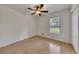 Bedroom featuring hardwood floors, a ceiling fan, and a window at 178 Castleair Ne Dr, Kennesaw, GA 30144