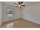 Bedroom featuring hardwood floors, a ceiling fan, and a window at 178 Castleair Ne Dr, Kennesaw, GA 30144