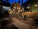 Backyard patio featuring an outdoor fireplace, Adirondack chairs, and covered porch at 1833 N Rock Springs Ne Rd, Atlanta, GA 30324