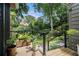 Charming backyard view from deck with lush landscaping and rock water feature at 1833 N Rock Springs Ne Rd, Atlanta, GA 30324