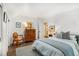 Serene bedroom features hardwood floors, a plush bed, and closet space with a clean, modern aesthetic at 1833 N Rock Springs Ne Rd, Atlanta, GA 30324