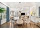 Bright dining room featuring modern chandelier and an open floor plan to other living spaces at 1833 N Rock Springs Ne Rd, Atlanta, GA 30324