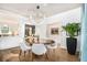 Dining room with modern chandelier, hardwood floors, and view into other living spaces at 1833 N Rock Springs Ne Rd, Atlanta, GA 30324