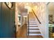 Inviting foyer with hardwood floors, staircase, and elegant lighting fixtures at 1833 N Rock Springs Ne Rd, Atlanta, GA 30324