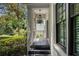 Charming front porch with painted brick, slate flooring, and stylish pendant lighting at 1833 N Rock Springs Ne Rd, Atlanta, GA 30324