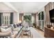 Spacious living room with lots of windows and hardwood floors and neutral color palette at 1833 N Rock Springs Ne Rd, Atlanta, GA 30324