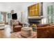 Bright living room showcasing a modern fireplace, art, and stylish seating at 1833 N Rock Springs Ne Rd, Atlanta, GA 30324