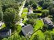 Aerial view of the home showing lush landscaping and neighborhood at 4140 Camaron Way, Snellville, GA 30039