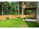 Well-maintained backyard featuring a wood fence at 4140 Camaron Way, Snellville, GA 30039