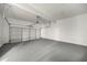 Spacious garage with an automatic door and sealed flooring at 4140 Camaron Way, Snellville, GA 30039