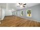 Spacious living room features new flooring, recessed lighting, and abundant windows at 4140 Camaron Way, Snellville, GA 30039