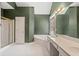 Spacious bathroom featuring a soaking tub, shower, and double vanity at 1765 Redbud Way, Cumming, GA 30041