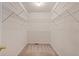 Empty walk-in closet with shelving at 1765 Redbud Way, Cumming, GA 30041