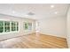 Finished basement featuring wood flooring and natural light from windows at 2359 Saint Kennedy Ln, Buford, GA 30518