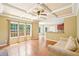 The living room features hardwood floors, trey ceilings and plenty of natural light at 2359 Saint Kennedy Ln, Buford, GA 30518