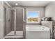 Modern bathroom with a separate shower and tub, offering a spa-like experience with natural light at 2829 Wild Laurel Ct, Norcross, GA 30071