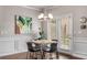 Dining room with modern light fixture and access to outdoor living at 2829 Wild Laurel Ct, Norcross, GA 30071